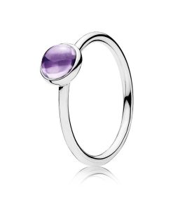 Silver ring with purple cubic zirconia