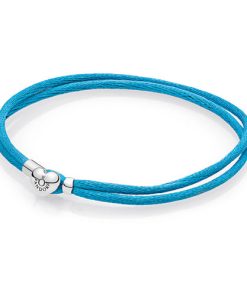 Silver double fabric cord bracelet. turquoise