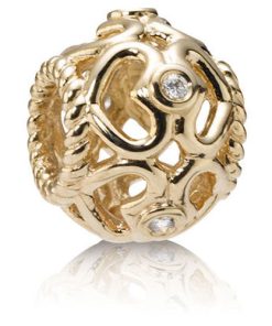 Openwork hearts gold charm. 0.05ct TW h/vs diamonds