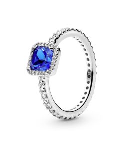 Silver ring with true blue crystal and clear cubic zirconia