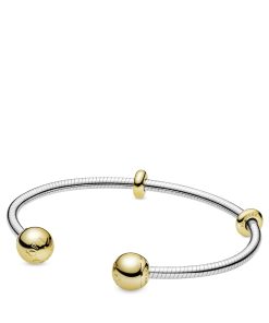 Sterling silver open bangle with 14k Gold Plated  silicone stoppers and interchangeable end caps