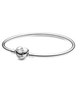 Silver bangle with heart-shaped clasp