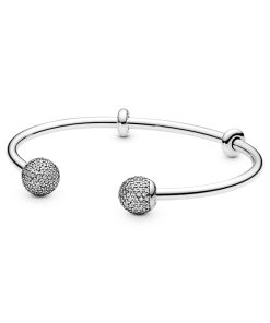 Silver open bangle with silicone stoppers and interchangeable end caps with clear cubiz ziconia