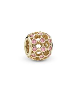 Openwork abstract gold charm with fancy pink cubic zirconia