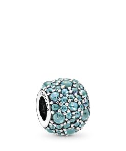Silver charm with teal cubic zirconia