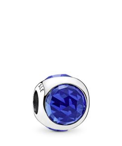 Silver charm with royal blue crystal